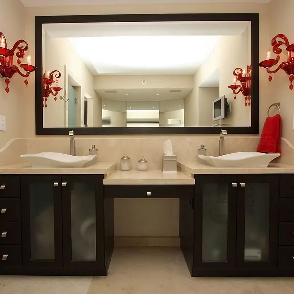 Custom mirror over a large bathroom vanity