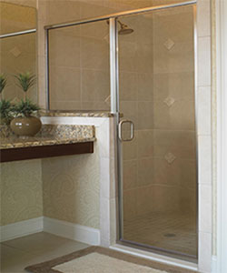 Semi-frameless glass shower door.