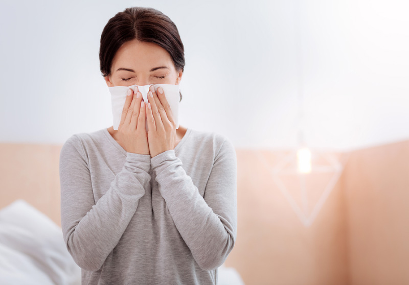 woman suffering from allergies