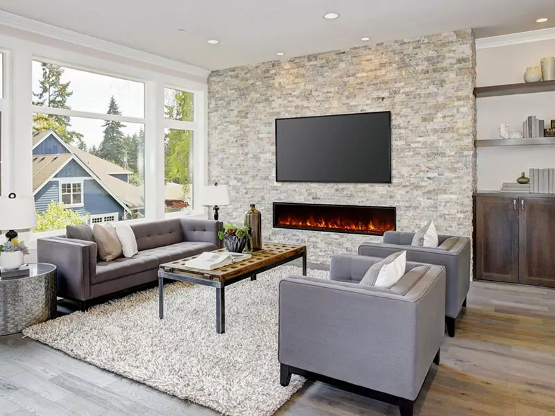 Electric fireplace in living room with a view.
