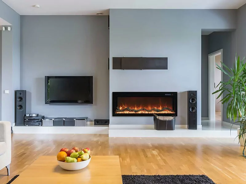Electric fireplace in living room with entertainment system.