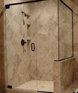 Frameless shower door with a pivot hinge.