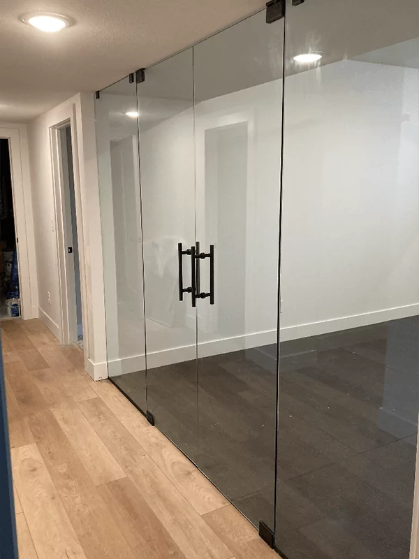 Custom glass doors for an exercise room.