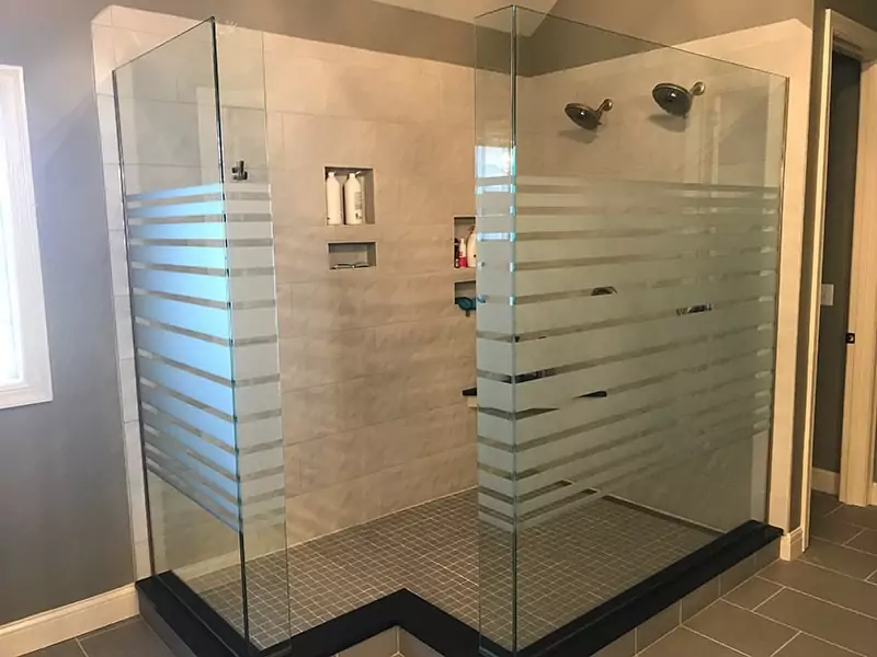 Custom glass shower doors with etched stripe design
