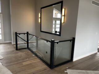 Custom stairway glass and mirror.