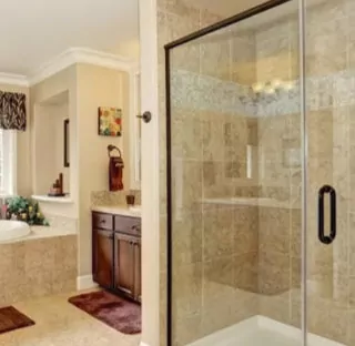 Glass shower doors in a large bathroom
