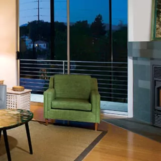 Small lit fireplace in an urban apartment