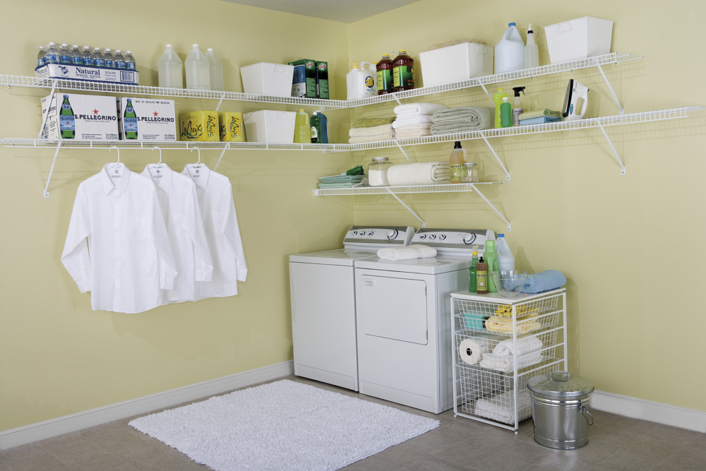 Spacious laundry room with organized products and clothing on wire shelving