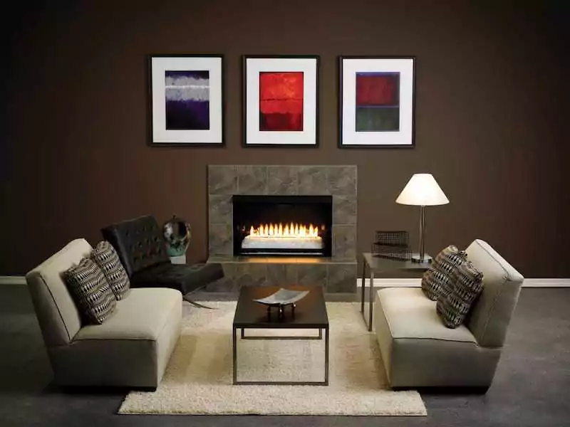 American Hearth Line vent free gas fireplace, inside a home with brown decor.