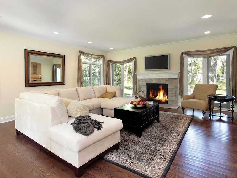 Superior Indoor gas fireplace inside an elegant home's living area.