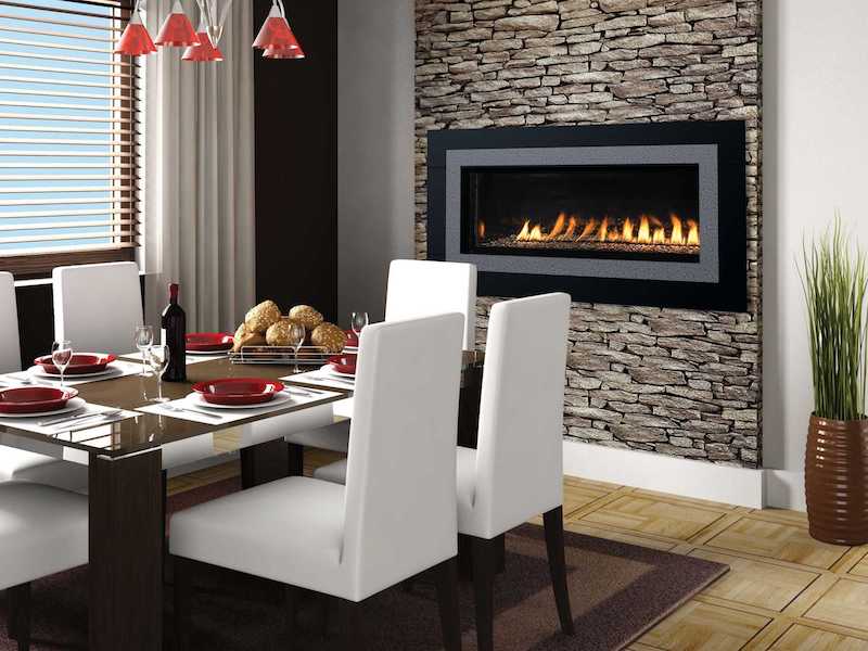 Superior Indoor gas fireplace inside a modern home's dining area.