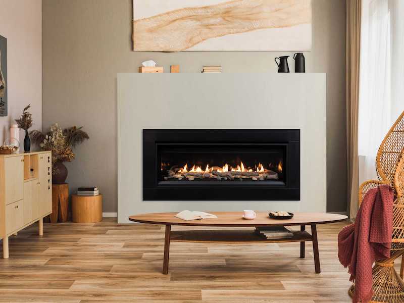 Superior Indoor gas fireplace inside a modern homes den.