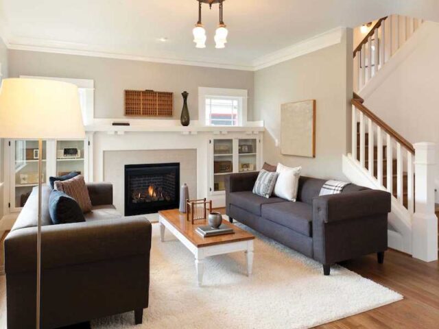 Superior indoor gas fireplace inside a home's brightly decorated living room.