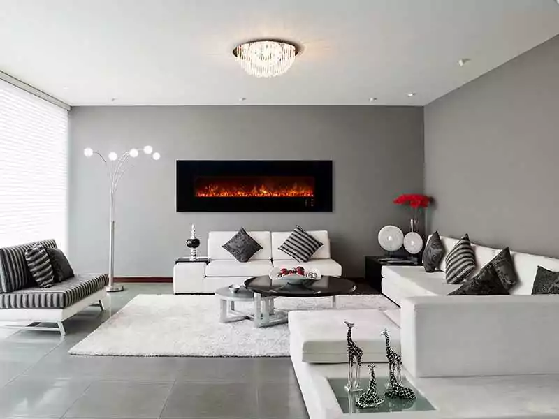 Electric fireplace as white room's focal point.