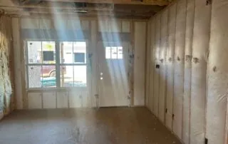 Entryway wall foam insulation installation