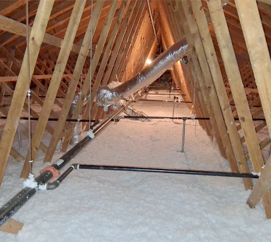 Blown in attic insulation, in home's attic.