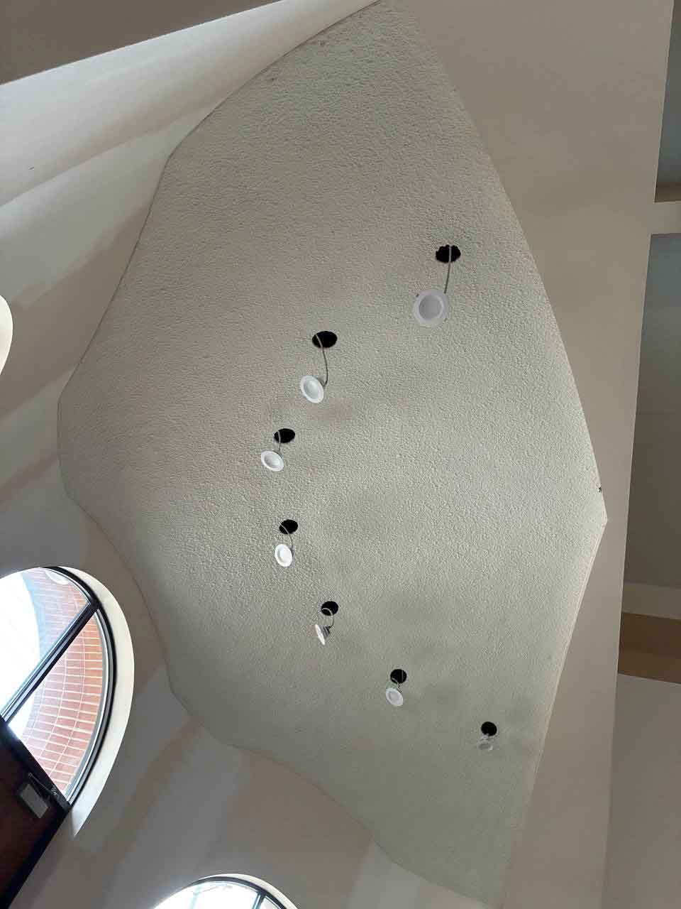 Sonaspray acoustical insulation on ceiling at St. Marks Catholic Church.